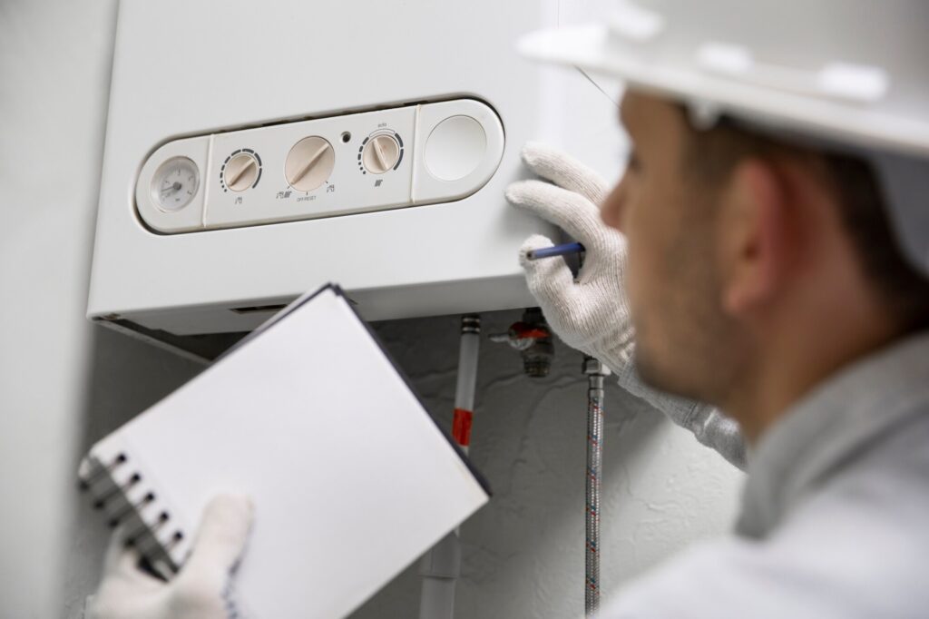 worker repairing water heater 23 2149334227